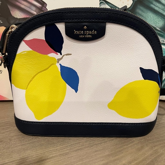 kate spade Handbags - Kate Spade White and Yellow Crossbody Bag